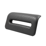 Side angle view of an Artesian Spas Island series replacement 8-inch waterfall headrest pillow in dark charcoal gray, showing its curved ergonomic profile and open slot.