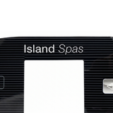 Close-up of the center section on an Artesian Spas Island Spas 3-pump TP800 touchpad overlay decal, showing the white "Island Spas" text printed over a black horizontal striped pattern above the square digital screen cutout.
