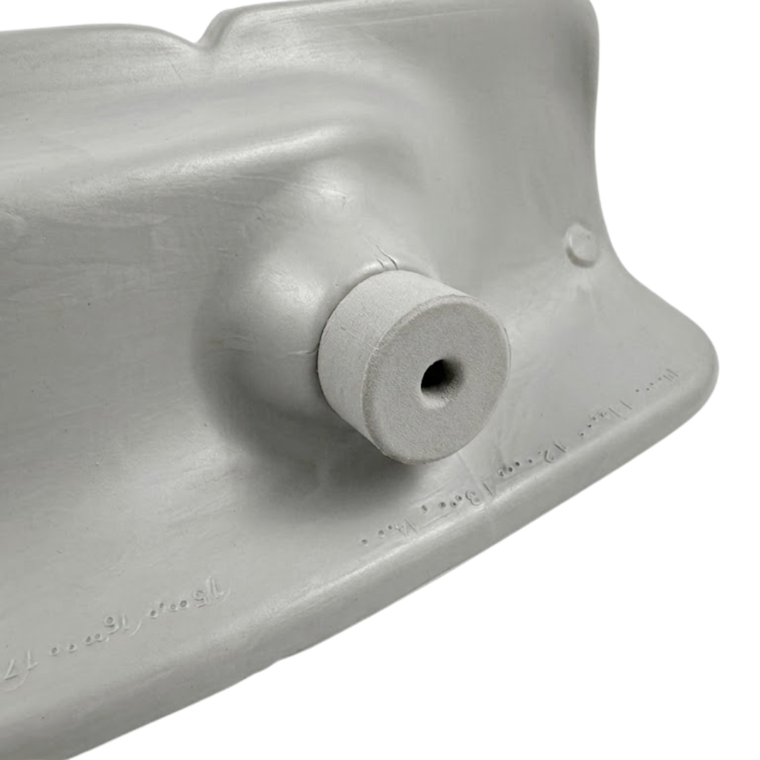Close-up view of the rear mounting pin and plug on an Artesian Spas Island series wrap headrest pillow for hot tub installation.
