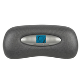 Front view of an Artesian Spas Platinum Elite series replacement 11-inch headrest pillow in dark charcoal gray featuring an oval silver insert with the blue Artesian Spas logo.