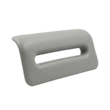 Side angle view of an Artesian Spas South Seas and Tropic Seas series replacement 8-inch waterfall headrest pillow in light gray, showing its curved ergonomic profile and open slot.
