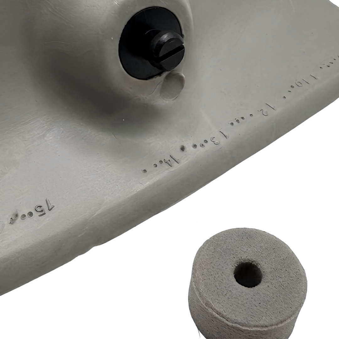 Close-up of an Artesian Spas wrap headrest pillow back structure, showing molded identification numbers near the mounting screw and a gray foam plug.