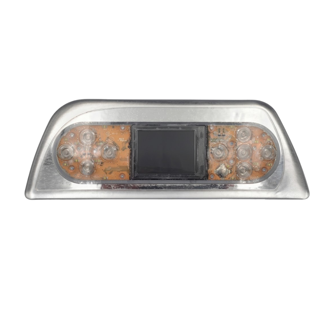 Front view of an Artesian Spas TP800 Island Spas touchpad panel without graphic overlay showing internal circuit board, buttons, and center LCD screen.