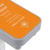 Close-up view of the Press to Pair Bluetooth button on an orange AstralPool Halo Chlorine Sensor model 525148