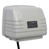 Three-quarter side view of the AstralPool Halo Xpand pool automation expansion unit, highlighting the casing design and bottom cord outlet against a white background.