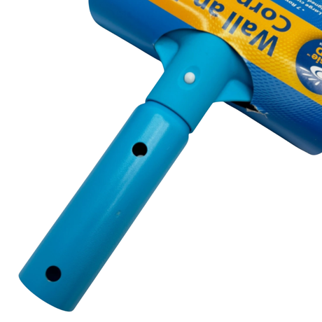 Close-up studio product photo of the blue plastic handle connection socket and white wishbone locking pin on an Aussie Gold Wall and Corner pool scrubbing brush, on an isolated white background.