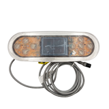Front view of a replacement Balboa TP800 TidalFit swim spa touchpad controller assembly without its graphic decal overlay, showing the clear plastic protective casing, exposed internal circuitry with button contacts, a central square digital LCD screen with a protective film, and an attached grey coiled data cable.