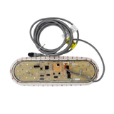 Rear view of an oval Balboa TP800 TidalFit swim spa touchpad controller, displaying the exposed printed circuit board inside a translucent housing, surrounded by a 3M adhesive mounting gasket, with a coiled grey connection cable and plug.