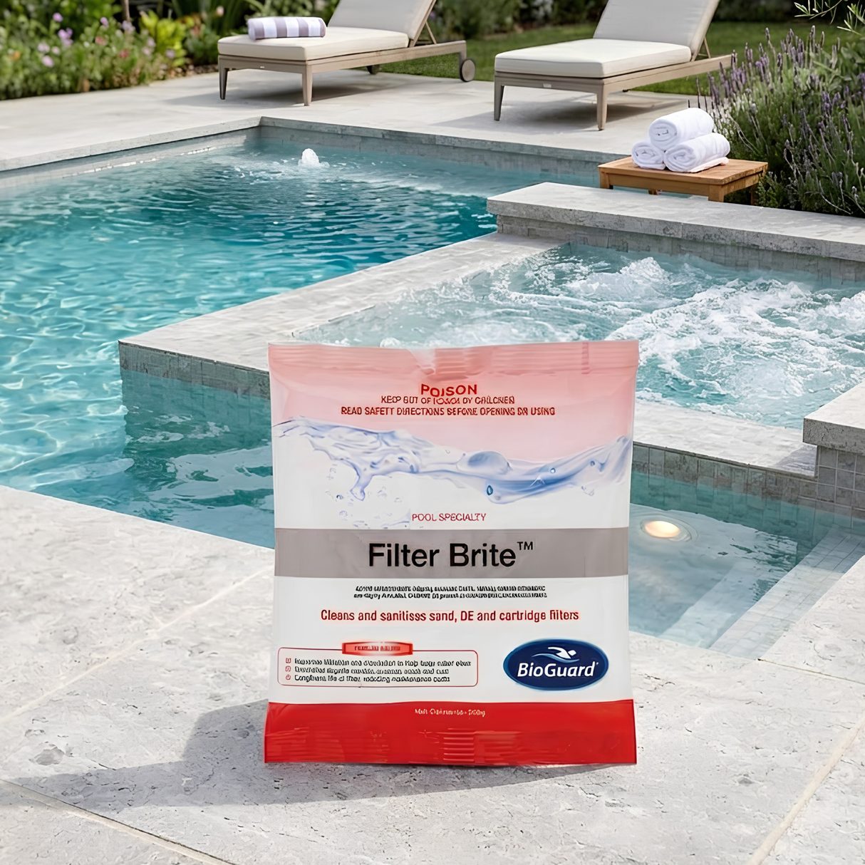BioGuard Filter Brite pool chemical sachet sitting on a stone coping deck next to an integrated backyard swimming pool and bubbling hot tub spa.