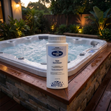 1kg bottle of BioGuard SPA Spa Sanitiser on a wooden hot tub deck at dusk, showing a stabilised chlorine treatment for clear and healthy spa water.