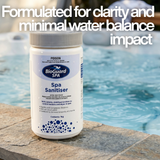 BioGuard SPA Spa Sanitiser 1kg on a stone spa edge with text: "Formulated for clarity and minimal water balance impact," highlighting its pH-neutral qualities for hot tubs.