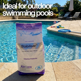 BioGuard Stabiliser 2kg bag on the edge of an outdoor pool with text overlay: "Ideal for outdoor swimming pools," highlighting the product's role in UV protection.