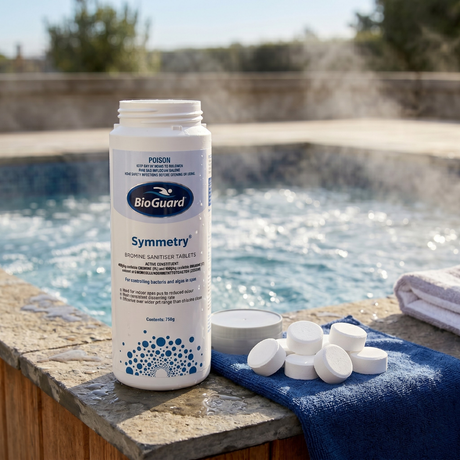 750g bottle of BioGuard Symmetry Bromine Sanitiser Tablets on a blue towel beside a steaming outdoor spa, featuring several white tablets to show the slow-dissolving solid form.
