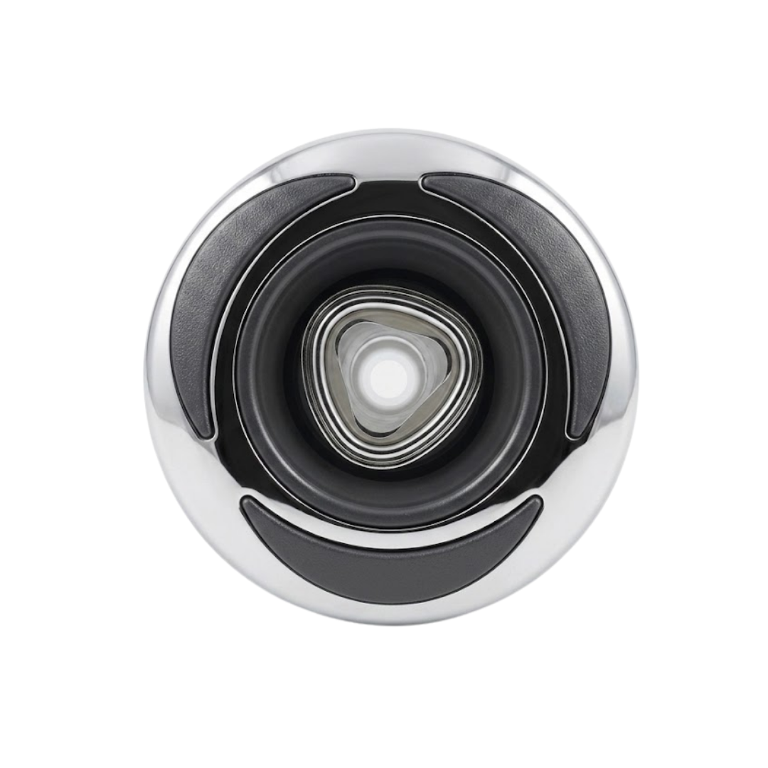 Direct overhead front view of a C-Helix 3 Directional SS spa jet internal insert, featuring a stainless steel bezel with three black crescent accents and a central directional eyeball nozzle with a rounded triangular opening.