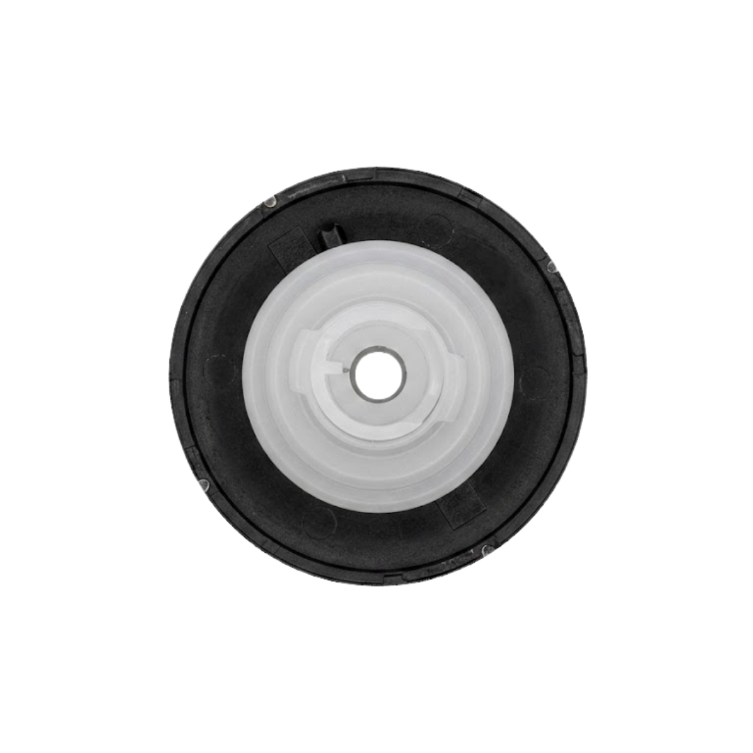 Direct overhead bottom-up view of the rear of a C-Helix 3 MSSG SS spa jet internal insert, showing the black face flange back and central white plastic stem.