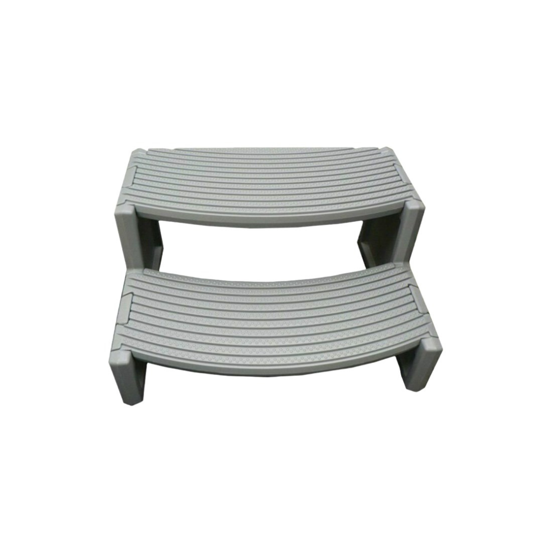 Light grey two-tier plastic Confer Plastics Handi-Step portable spa and hot tub entry stairs featuring curved anti-slip tread grooves.