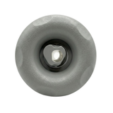 Direct overhead front view of a Cyclone Adj Swirl Emerald Large Face spa jet internal insert, featuring a textured light grey scalloped bezel and a central grey rotational swirl nozzle.