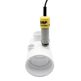 An ORP sensor probe with a yellow collar label threaded vertically into a white PVC T-piece plumbing manifold housing for a Davey Eco Spa salt chlorinator system.