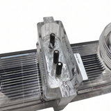 Close-up view of the three-pin power connection terminal on a clear replacement cell for a Davey EcoSalt chlorinator, showing model sticker M0881 and internal sealing grease.