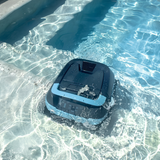 Maytronics Dolphin EON 120d cordless robotic pool cleaner operating submerged in clear blue water next to shallow pool steps.