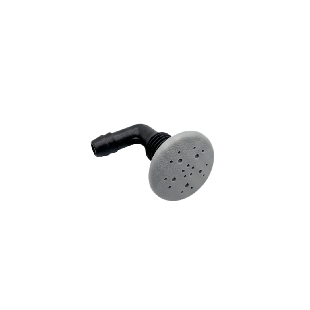 An angled view of a grey Edgetec O2 spa air injector fitting showing the round textured multi hole face cap attached to a black 90 degree barbed plumbing elbow