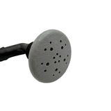 Close up front view of a grey Edgetec O2 spa air injector highlighting the round textured face cap with its distinctive multi hole spray pattern