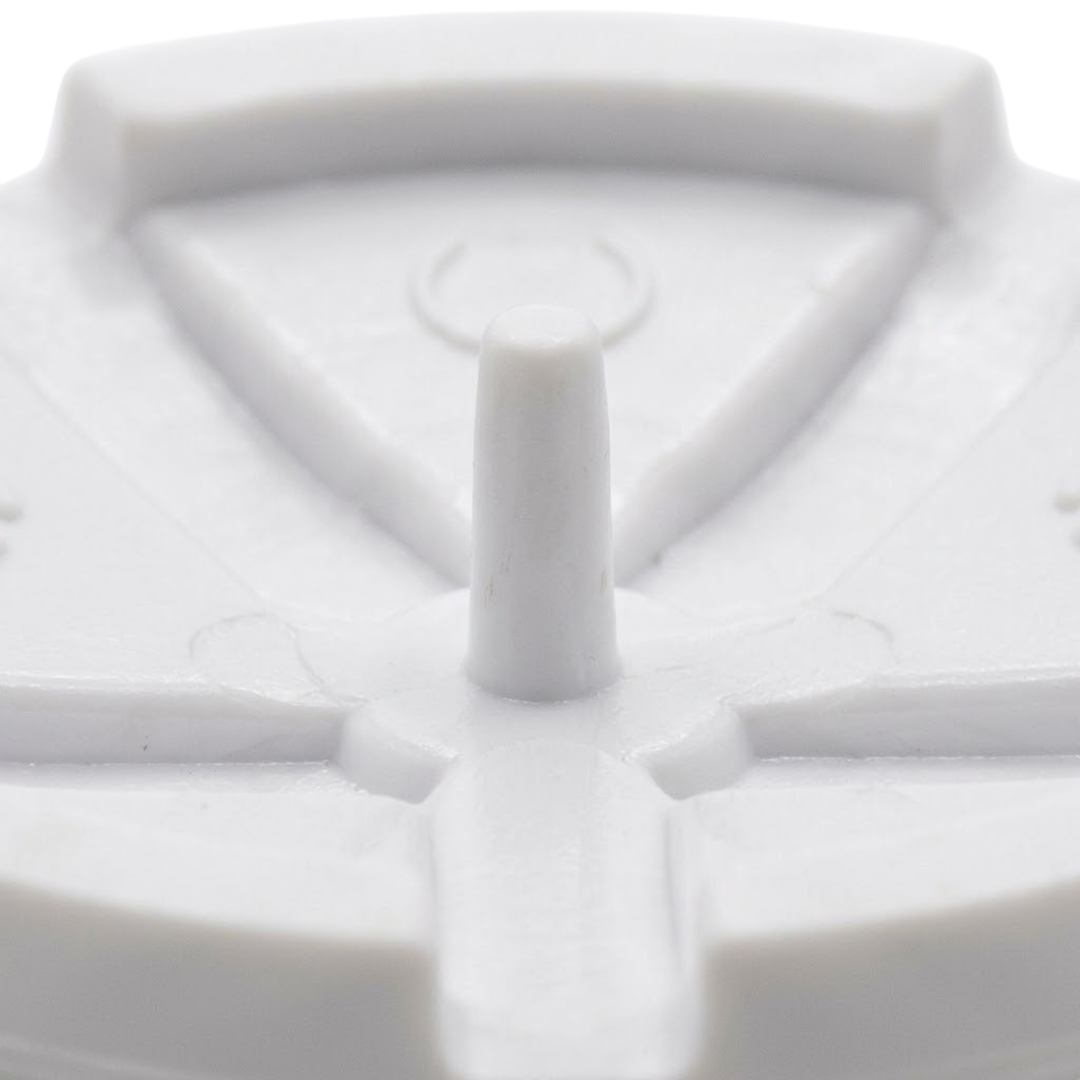 Macro close-up shot of the rear mounting pin and molded spokes on a white Edgetec spa air injector cover cap.