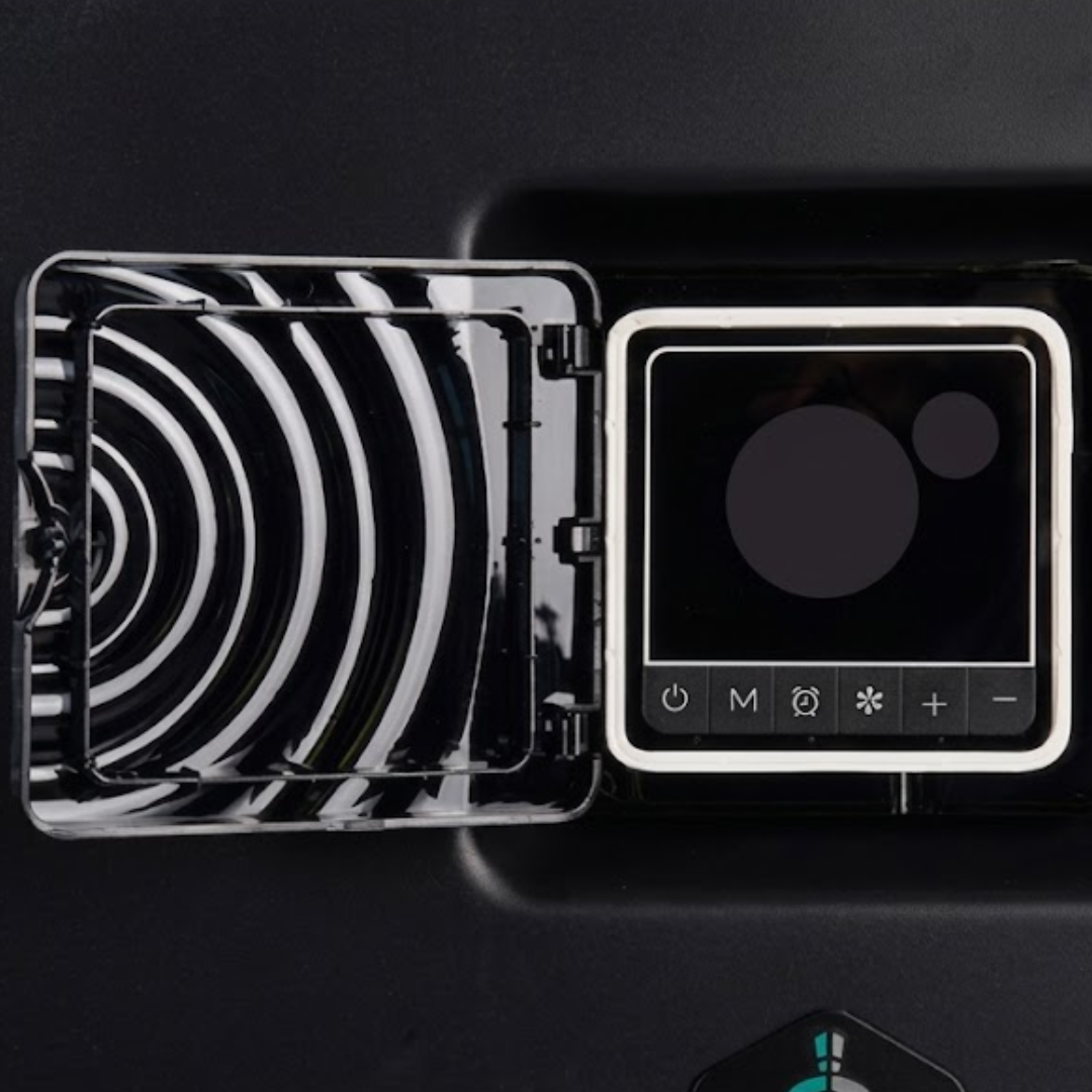 Close-up view of the digital control panel on a Guardian Eco Pro Series pool heat pump, featuring an open hinged transparent protective cover revealing a screen and touch buttons for power, mode selection, timer, fan, and temperature adjustment.