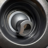 Close-up view of the central nozzle on a Halo 4.5 ROTO plastic spa jet internal insert, showing its dark grey rotational eyeball nozzle housed within a textured circular bezel.