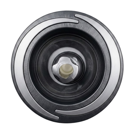 Direct overhead front view of a Halo 5 ROTO plastic spa jet internal insert, featuring a textured black bezel with three silver crescent accents and a central rotational nozzle.