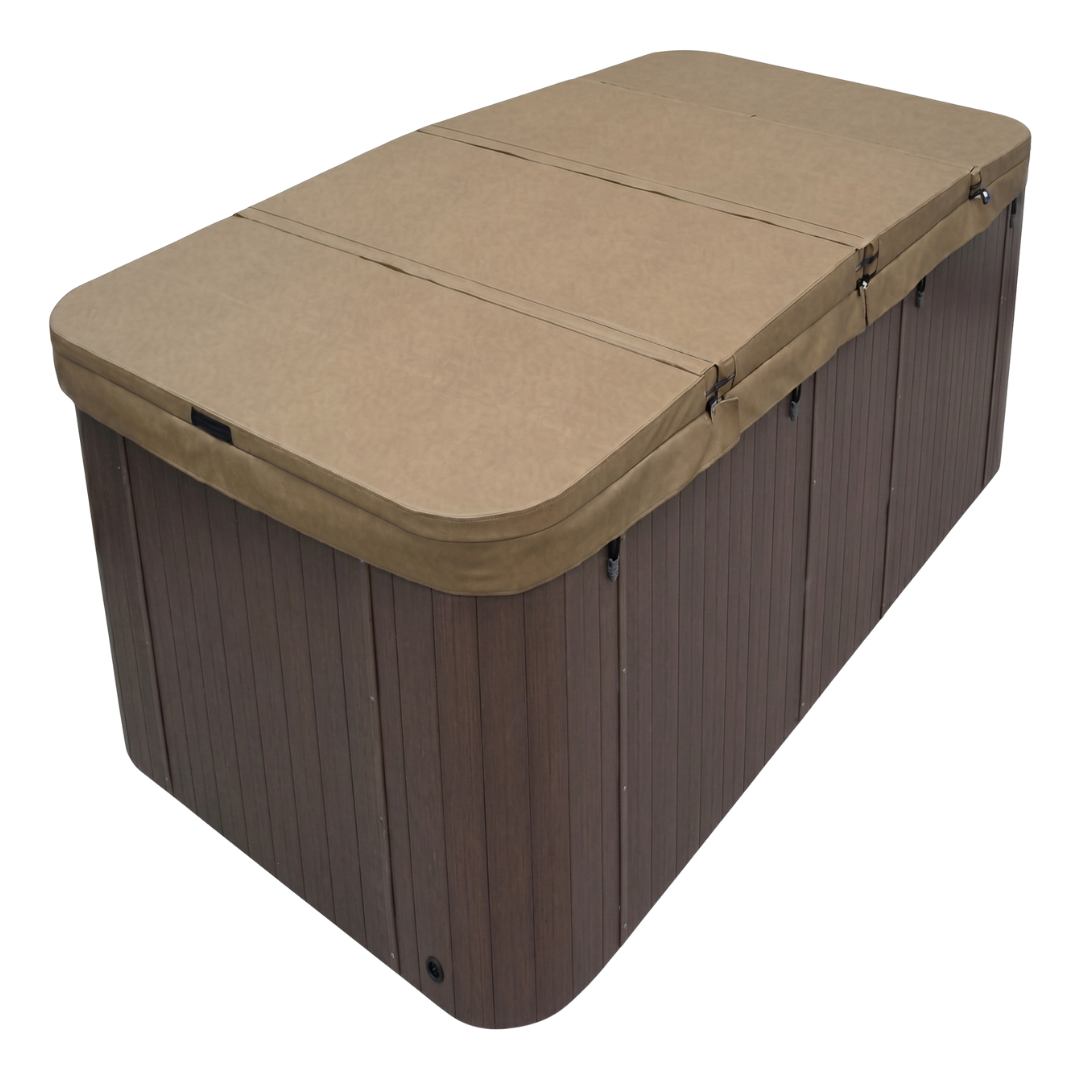 Custom-made hard cover in tan vinyl installed on a rectangular outdoor swim spa with brown wood-look paneled siding.