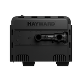 Direct side profile view of a black Hayward Universal H-Series Low NOx 400MJ pool and spa heater, highlighting the plumbing water connection inlets and outlets.