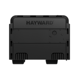 Direct side profile view of a black Hayward Universal H-Series Low NOx 400MJ swimming pool and spa heater showing the closed access panel side opposite the water connections.