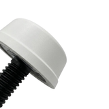 A macro close up profile view of a white Herga spa air button showing the finely textured round bellows push cap attached to the black threaded stem collar