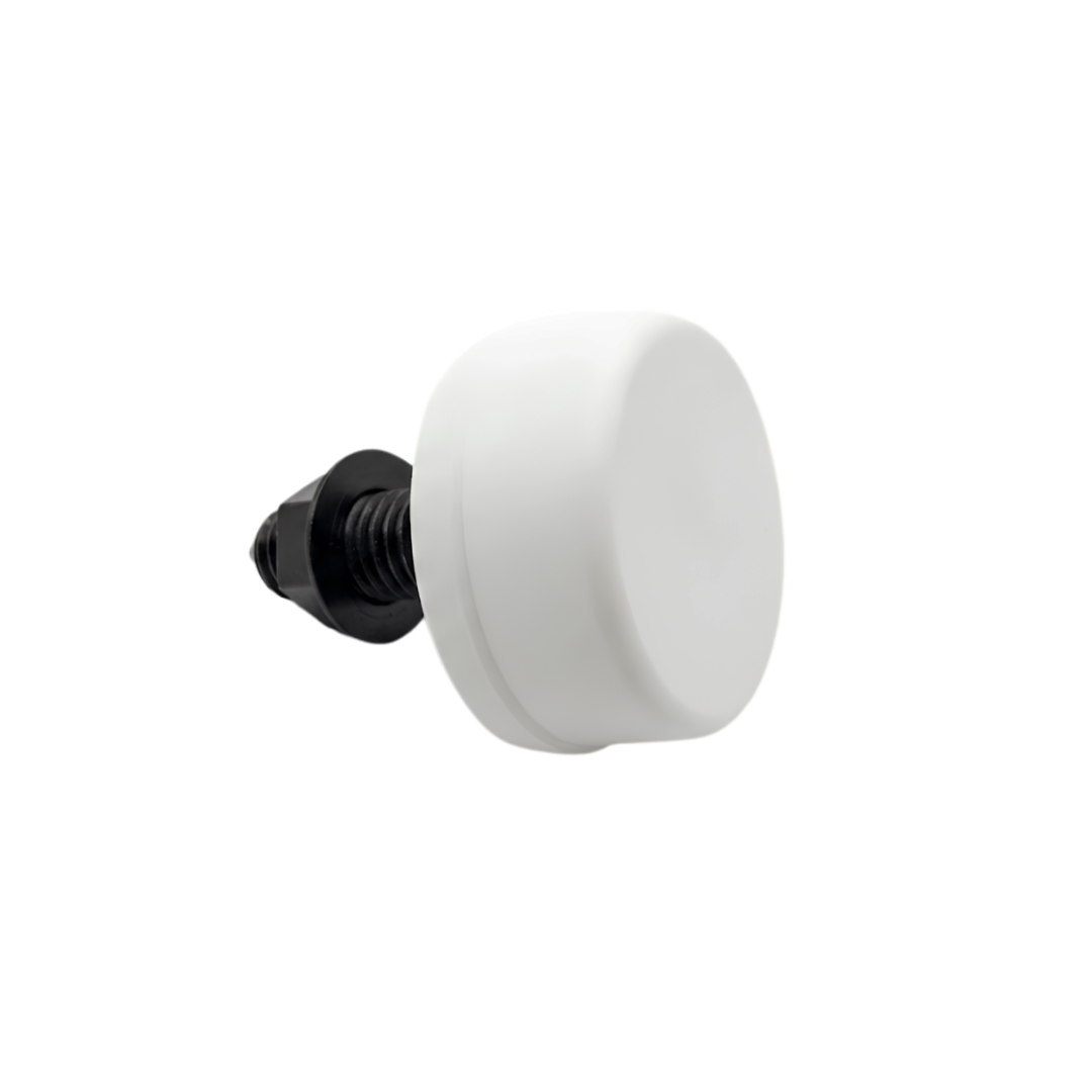 An angled side view of a white Herga spa air button switch showing the raised round white bellows cap and black plastic threaded mounting stem with lock nut