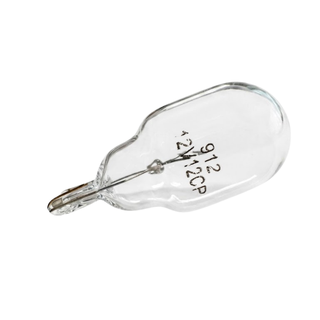 Angled perspective view of an inground spa GE912 12V incandescent light globe lying against a plain background, showing printed specifications 912 12V 12CP and the T10 wedge base.