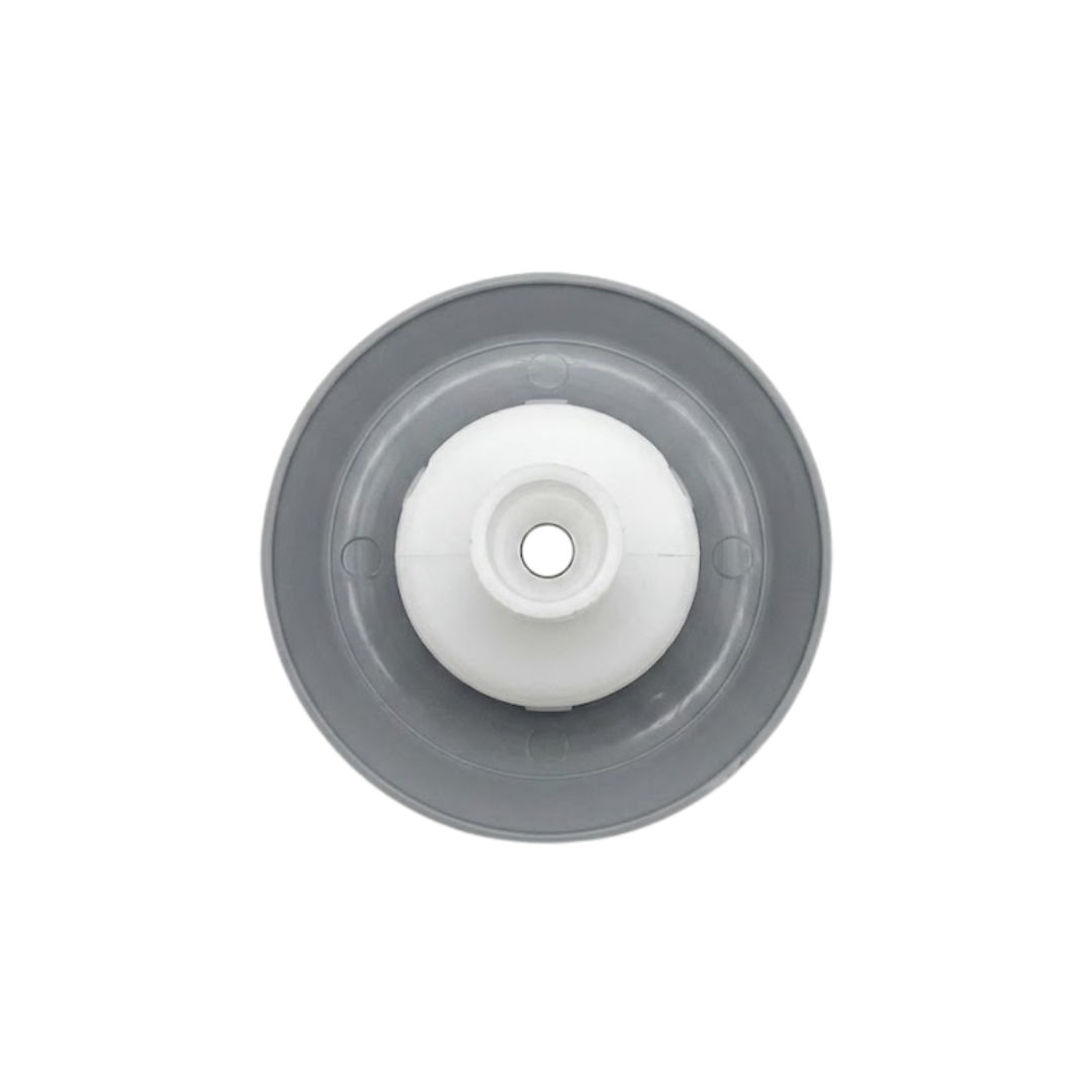 Direct overhead bottom-up view of the rear assembly on a Jet Cyc Luxury Adj Swirl Emerald 3.5 spa jet insert, showing the dark grey face flange, grey inner collar ring, and central white plastic stem.