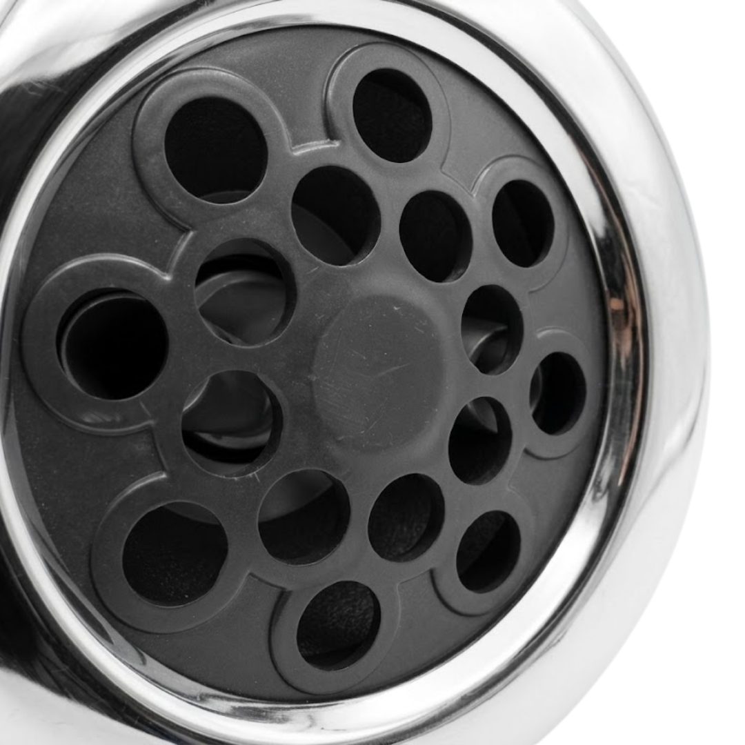 Close-up view of the dark grey multi-port massage nozzle faceplate on a Jumbo Mssg 7in spa jet internal insert, framed by a smooth stainless steel outer bezel.