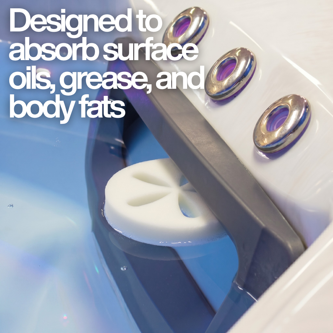 A white Life Spa Disc oil-absorbing sponge floating inside a hot tub's skimmer box to clean the water surface. Text overlay reads, "Designed to absorb surface oils, grease, and body fats."