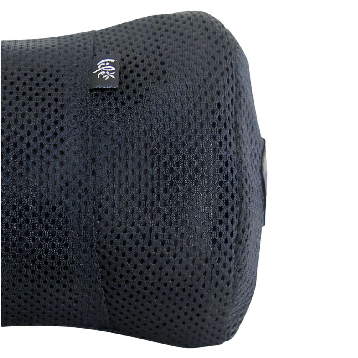 A detailed close-up studio shot of a black Life Spa Pillow isolated on a white background, showcasing the highly textured, quick-drying porous mesh fabric weave and the small woven Life brand logo tag sewn into the upper seam.