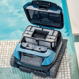 Maytronics Dolphin Eon 100 cordless robotic pool cleaner sitting poolside with its top lid open to reveal the large top-loading filter basket canister
