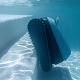 Underwater view of a Maytronics Dolphin Eon 100 robotic pool cleaner using its treaded tracks to climb submerged pool steps