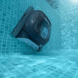 Underwater shot of the Maytronics Dolphin Liberty 200 robotic pool cleaner actively climbing a tiled pool wall.