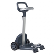 Three-quarter studio view of an empty Maytronics Dolphin universal pool cleaner transport caddy on an isolated white background, featuring a dark grey plastic base frame, dual side transport wheels, upright metallic silver column, top dark grey handle, power supply holder tray, and integrated cable hook.