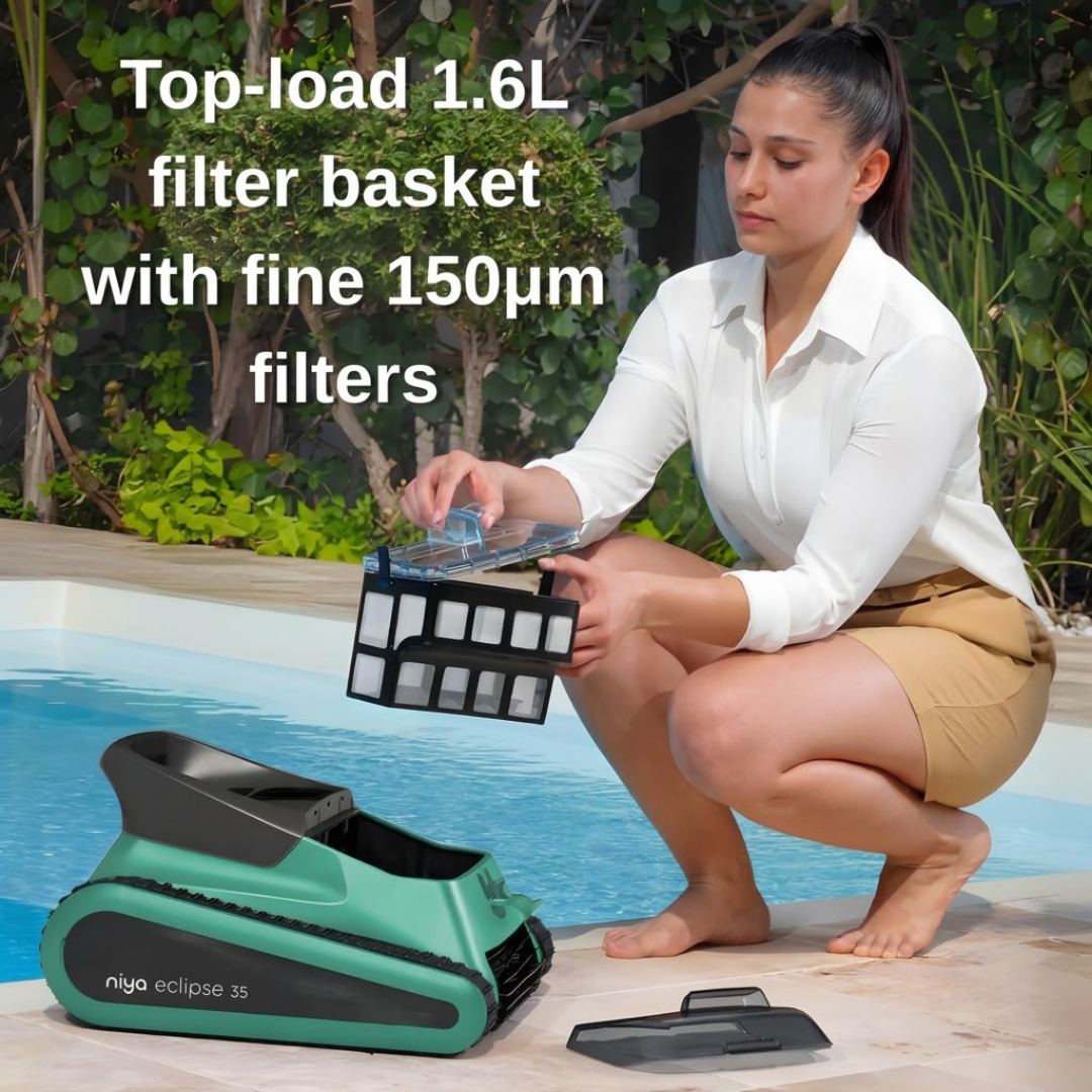 Promotional lifestyle graphic for the Maytronics Niya Eclipse 35 robotic pool cleaner highlighting "Top-load 1.6L filter basket with fine 150µm filters," showing a woman crouching poolside holding the removable mesh filter basket next to the open unit.