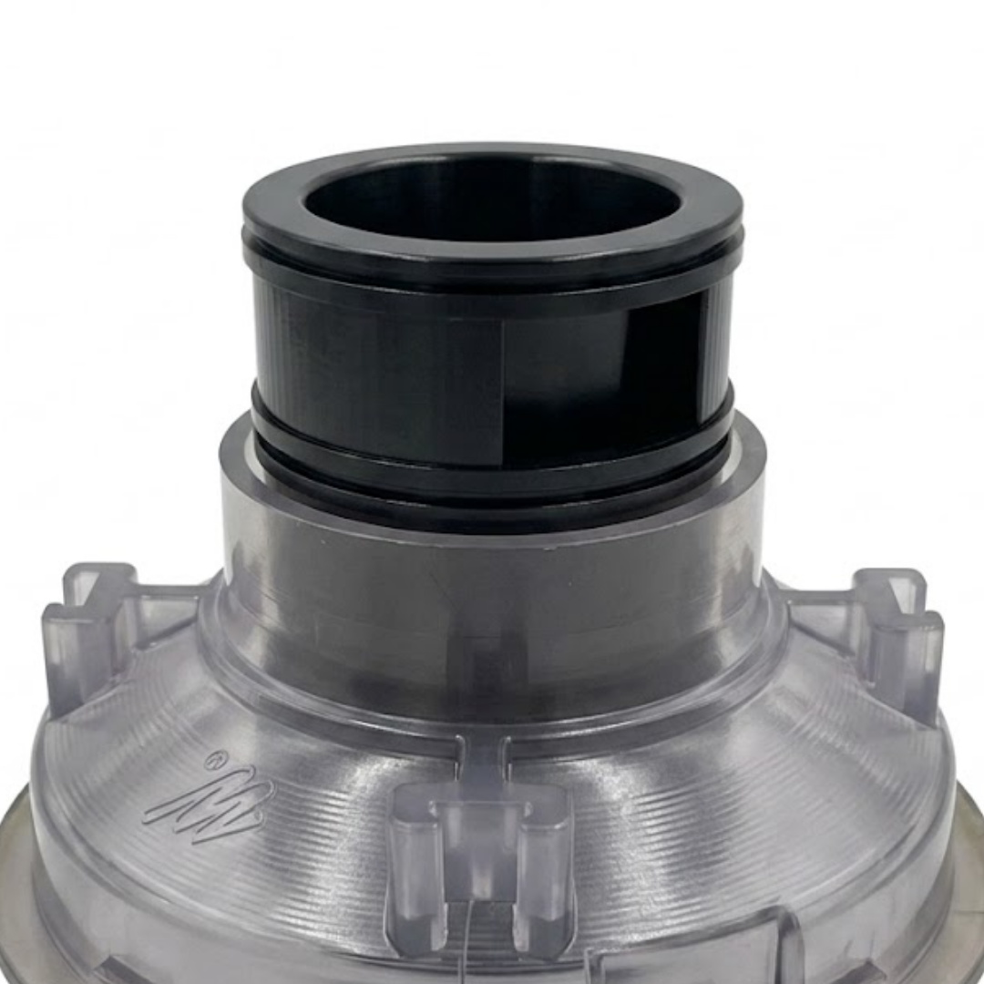 Close-up view of the rear assembly on an Ovo Swim With Metal 2in SX 12in artesian spa jet insert, showing the clear plastic body housing with mounting tabs and the black cylindrical stem with side porting.