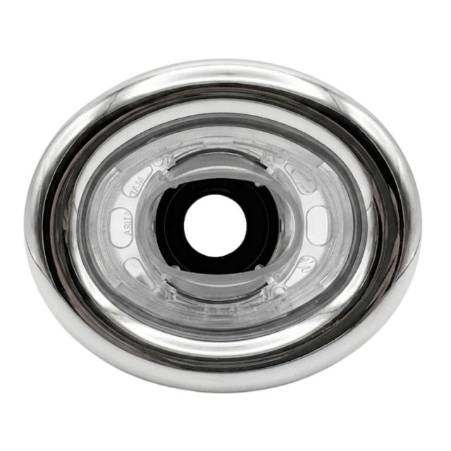 Direct overhead front view of an Ovo Swim WMetal 2in SX 12in Artesian spa jet insert, featuring an oval stainless steel trim bezel and clear plastic internal nozzle housing with a central black port.