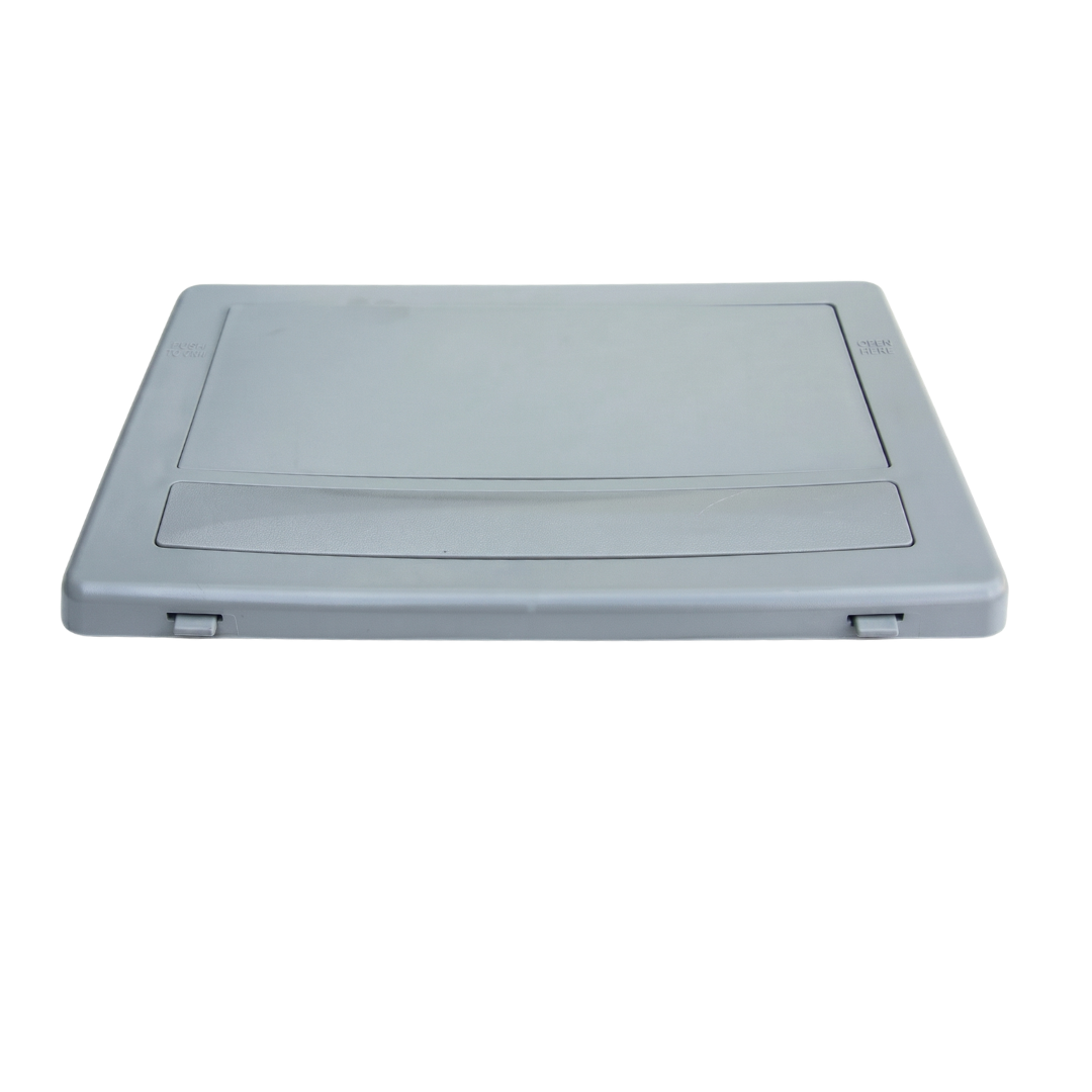 Low angled perspective of a grey wide mouth pool skimmer faceplate and flap door assembly highlighting the bottom snap-in tabs and molded side text