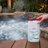 A 1L bottle of Poppits Peroxsil 395 Chlorine Free Pool Sanitiser held by a person over a bubbling spa, highlighting the hydrogen peroxide formula approved by the National Asthma Council.