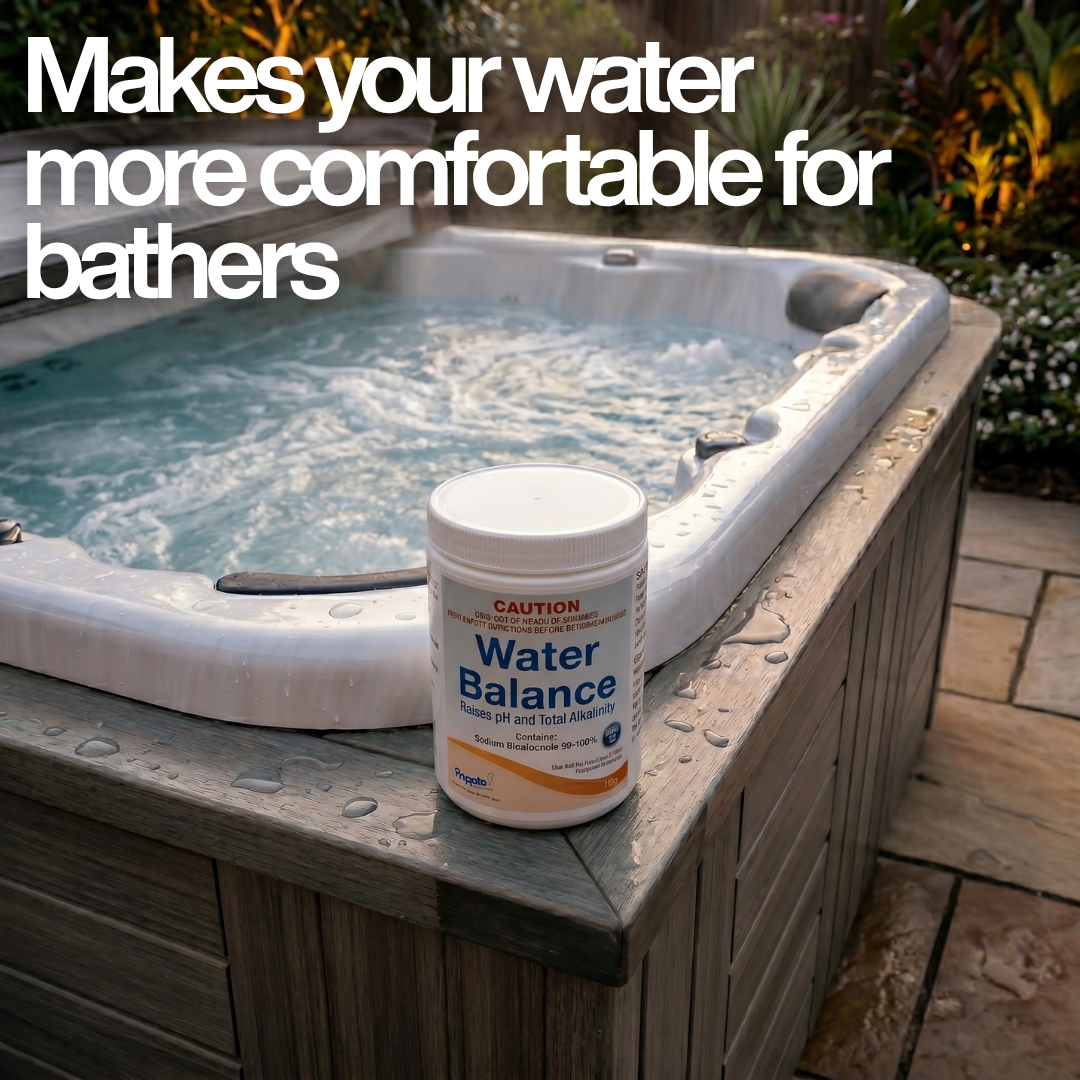 A tub of Poppits Water Balance chemical placed on the corner of an outdoor hot tub with steaming water. The text overlay reads "Makes your water more comfortable for bathers," and the product label shows it raises pH and Total Alkalinity using Sodium Bicarbonate.